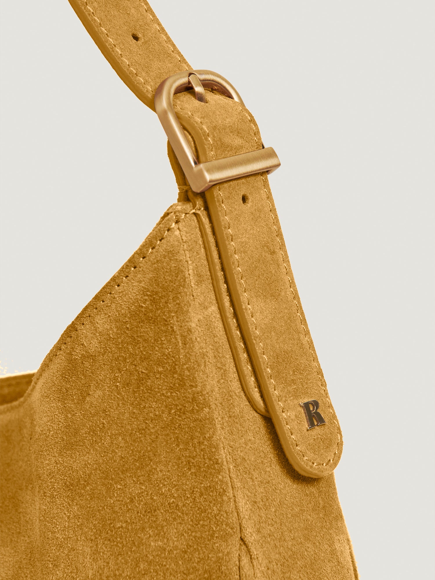 Beige suede online bag