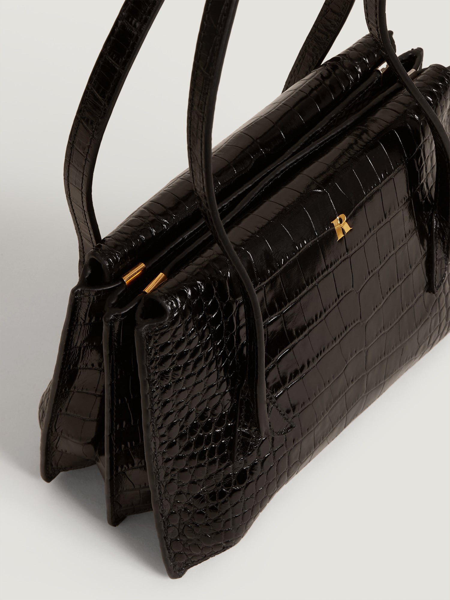 Sac a main en cuir aspect croco noir Rouje